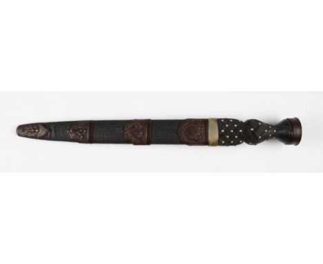 A late 19th Century dress Dirk dagger, the blade having a thistle and foliage design to both sides of the blade with the blad