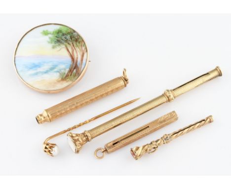 A lot to include a 9ct yellow gold framed hand painted ceramic circular pin brooch, depicting trees by waters edge, stamped 9