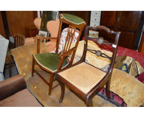 A mahogany and cane seated ladder back chair and an elbow chair