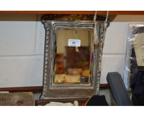 An early 20th Century silver framed easel mirror