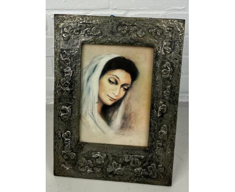 AN ARTS AND CRAFTS STYLE SILVER PICTURE FRAME, Print of lady within. 40cm x 29cm 