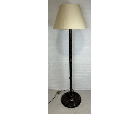 A BLACK LACQUERED CHINOISERIE STANDARD LAMP BY OKA, 145cm H With shade. 