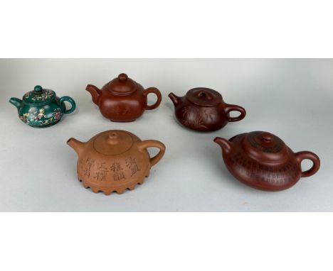 A COLLECTION OF CHINESE YIXING CLAY TEA POTS AND COVERS (5) All with seal marks to verso. Largest 18cm x 13cm