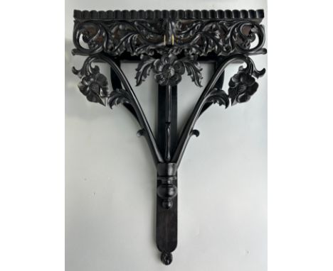 AN EBONISED WOODEN WALL SHELF WITH ELEPHANT, 52cm x 40cmIvory exemption license: VF1XCS3L 