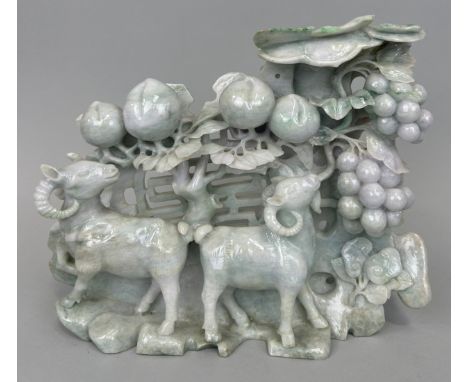 A LARGE CHINESE CARVED JADE GROUP DEPICTING GOATS, 26cm x 22cm 