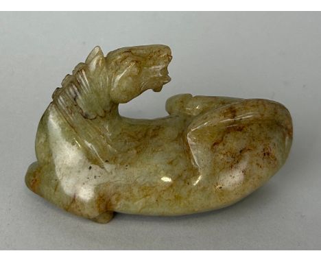 A CHINESE CARVED JADE FIGURE OF A HORSE, 8cm x 4cm 