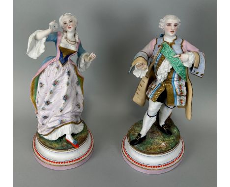 A PAIR OF FRENCH STYLE CERAMIC FIGURES, 36cm H 