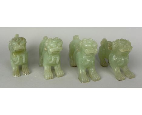 A GROUP OF FOUR CHINESE JADE LIONS (4), 10cm x 7cm each. 