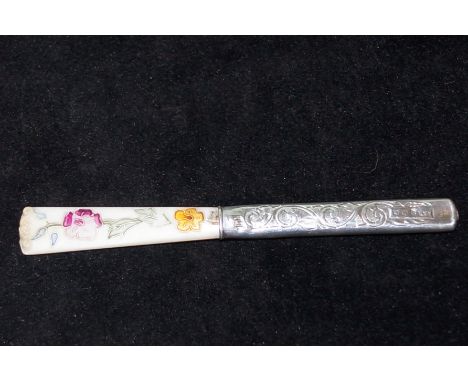 Silver handled, mother of pearl nail file