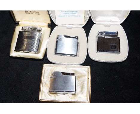 Ronson cigarette lighter and 3 others