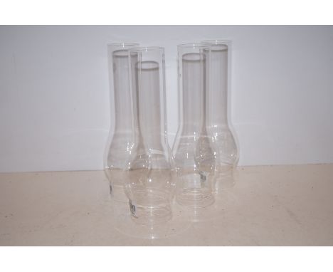 Four oil lamp chimneys 