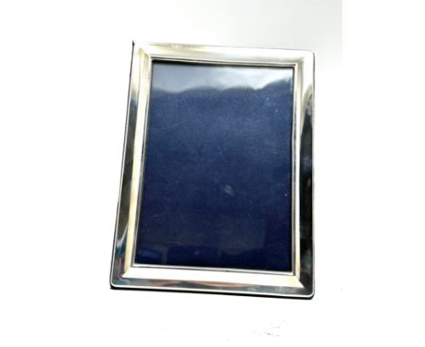 Vintage silver picture frame measures approx 21cm by 15.5cm 