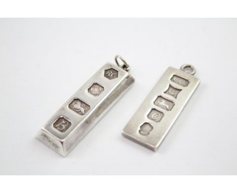 Two vintage 1970s silver ingot pendants including the Queens Jubillee 