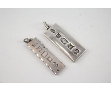 Two vintage silver 1970s ingot pendants including Queens Jubillee 