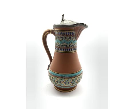 Christopher Dresser for Watcombe pottery,  Aesthetic Movement terracotta jug decorated with geometric enamel bands, the pewte