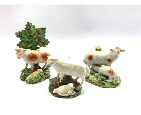 Two early 19th century Staffordshire Pearlware figures, the first modelled as a sheep and lamb before bocage, the sheep initi