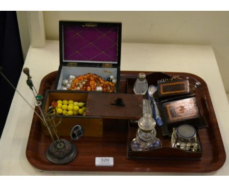 A silver cigarette case, a silver and enamel glass inkwell, a silver mounted glass bottle, a set of six silver forks, a quant