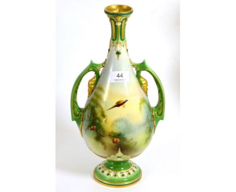 A Royal Worcester vase painted by A C Lewis decorated with pheasants 