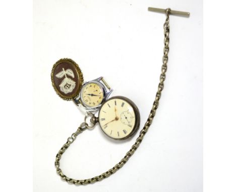 A silver pocket watch, Ingersoll wristwatch and a silver pendant locket containing a lace flower 