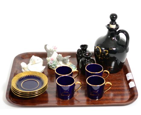 Two Lladro groups; ducks and a kitten; a collection of Queen Elizabeth II ceramics comprising a whisky flagon; two miniature 