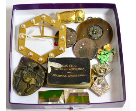 Five Art Deco buckles, including a simulated pearl octagonal example, a paste set example, two mother of pearl examples and t