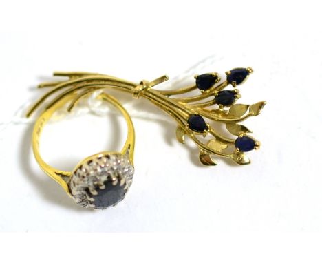 An 18 carat gold sapphire and diamond ring, finger size K and a 9 carat gold sapphire spray brooch, length 4.5cm (2) Ring - 4