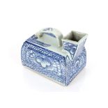 An unusual 19th Century Chinese porcelain blue and white vessel of rectangular form, having strap
