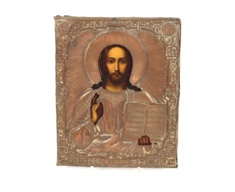 A 19th Century Russian icon of Christ, painted on a wood panel with well detailed silvered copper oclad, 27cm x 22cm&nbsp;