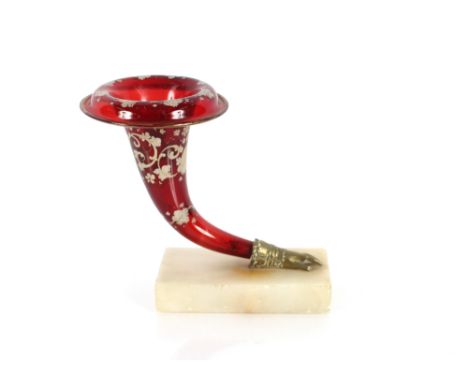 A 19th Century ruby glass Cornucopia hand vase, with floral decoration on onyx plinth, 18cm high