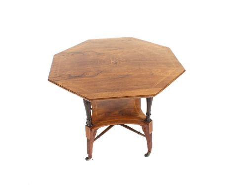 An Edwardian rosewood and satinwood inlaid octagonal occasional table, raised on ring turned columns and out swept square tap