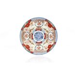 A large 19th Century Imari charger, 47cm dia.