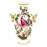 A Chelsea porcelain baluster vase, decorated birds and foliage flanked by gilt heightened floral