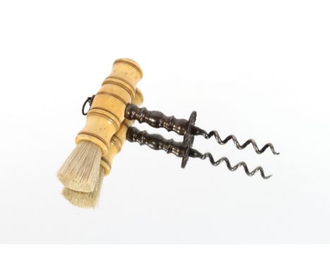 A Georgian bone handled steel corkscrew, with integral brush