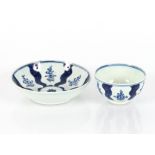 An 18th Century English porcelain blue and white tea bowl and saucer