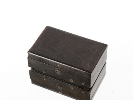 A 19th Century tortoiseshell musical snuff box, the lid decorated with a rural scene (end panel missing)