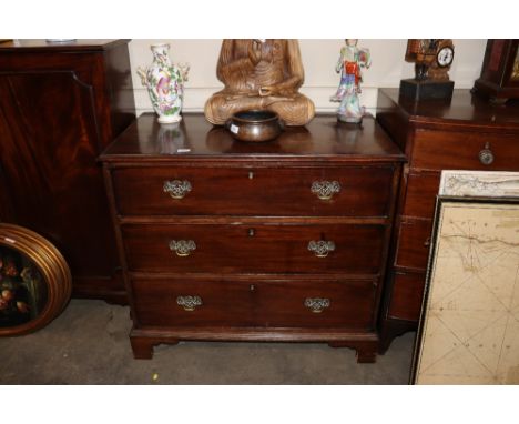 A George III mahogany chest of three long drawers, raised on bracket feet, 95cm wide x 54cm deep x 66cm high&nbsp;