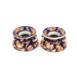 A rare and unusual pair of Masons stoneware Imari decorated table spittoons in the "Old School