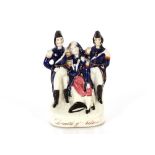 A rare mid 19th Century Staffordshire group "Death of Nelson", 20cm high