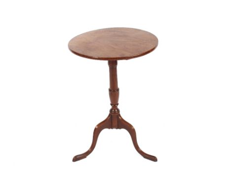 An Early 19th Century yew wood and mahogany tripod occasional table, raised on baluster column, the top 47cm dia. 70cm high