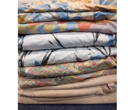 A quantity of mixed curtains in various patterns to include beige full length suedette curtains and 2 pairs of matching short