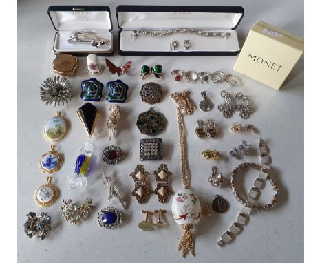 A quantity of costume jewellery and other items, mainly late 20th Century brooches, earrings, necklaces, bracelets and pendan