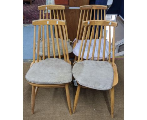 A set of four retro Ercol style spindle back dining chairsLocation: 