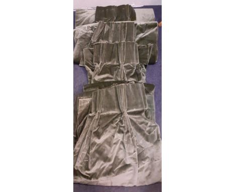 Two pairs of vintage mid green velvet curtains having triple pleated headings and taupe lining, one pair measuring 93" drop x