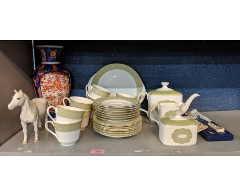 A mixed lot of china to include a part Wedgwood tea set Sonnet pattern, a Beswick model of a horse, and a vase decorated with