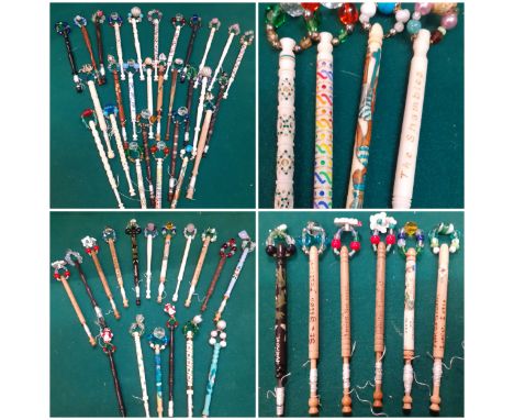 A collection of 28 vintage bobbins belonging to the late Anne Diss to include 1980's and 1990's Nicholas Perrin turned bobbin