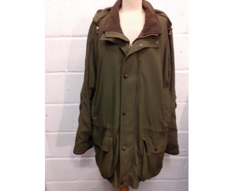 Barbour-A green breathable padded cotton country pursuit jacket having a drawstring waistband and detachable hood, a brown fe