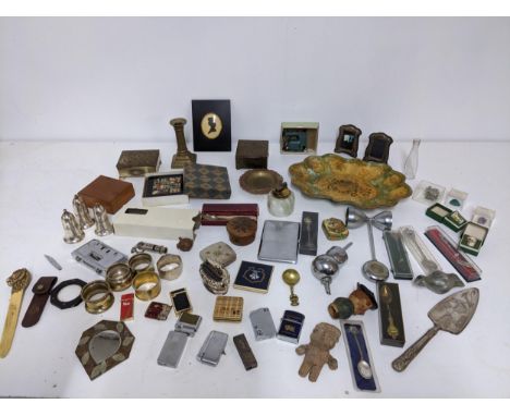 A mixed lot to include two silver photograph frames, a John Sterling lighter and others, celluloid letter opener, silhouette 