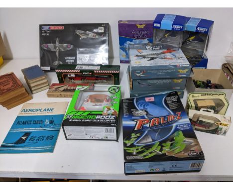 A mixed lot of model aircraft, diecast vehicles and other toys and books to include Observer books on aircraft, hobby collect