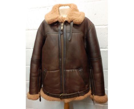 An Irvin gents brown sheepskin and leather RAF Flying jacket, size 44"chest, Large, having a belt to the hem. Location:Rail 