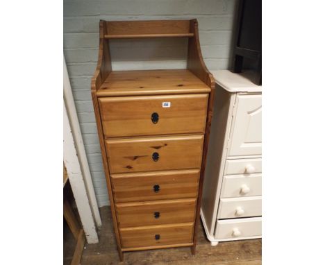 An 18" pine tallboy chest of 5 drawers with shelf back 